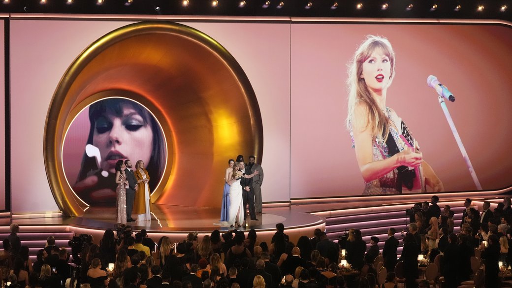 Taylor Swift accepts the award for album of the year for “MIdnights” during the 66th annual Grammy Awards on Sunday, Feb. 4, 2024, in Los Angeles. (AP Photo/Chris Pizzello)